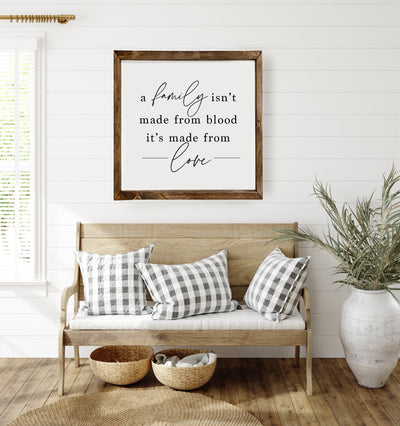 A Family Isn't Made From Blood | Wood Framed Adoption Sign - Mulberry Market Designs